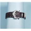 Image 1 : An unusual 18 kt. white gold, diamond and ruby bracelet. Collette set rows of rubies decorated wi…