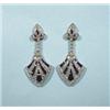 A pair of 18 kt. gold, sapphire and diamond pendant earrings. Each medalion shaped pendant set wi…