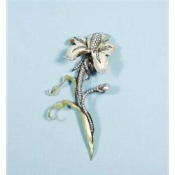 An important diamond set 18 kt. yellow and white gold orchid brooch with enamelled petals. Set wi…