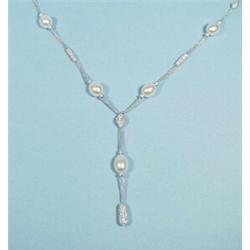 A very fine 18 kt. white gold and pearl necklace. Fine mesh chain interspaced with oval form fres…