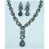 Image 1 : An important 18 kt. white gold, diamond and green garnet suite designed by Paolo Piovan. Heavy 18…