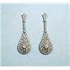 Image 1 : A pair of 18 kt. white gold diamond set earpendants. Each pear shaped drop of very fine filligree…