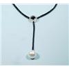 An exceptional black diamond and pearl necklace. A central pave set diamond circular decoration w…