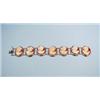 Image 1 : A gold cameo bracelet. With 7 finely carved cameo links joined by chain. 7" long. Marked.…
