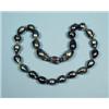 Image 1 : A very good South Sea black pearl necklace made of 24 high lustre baroque pearls, 12-20 mm., diam…