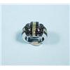 Image 1 : An unusual 18 kt. white gold, black and diamond cocktail ring set with alternating rows of black …