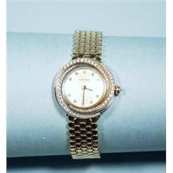 Cartier - A very good ladies 18 kt. yellow gold and diamond "Trinity " bracelet watch. Diamond se…
