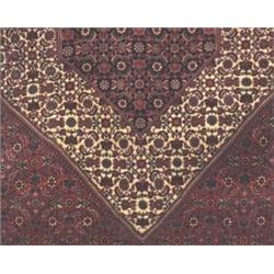 A Persian Bijar carpet. Appx. size: 13'2" x 9'11".…