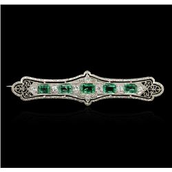 18KT White Gold 1.30ctw Emerald and Diamond Brooch