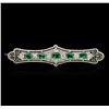 Image 1 : 18KT White Gold 1.30ctw Emerald and Diamond Brooch