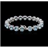 Image 2 : 14KT White Gold 27.80ctw Topaz and Diamond Bracelet