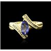 Image 1 : 14KT Yellow Gold 0.99ct Tanzanite and Diamond Ring