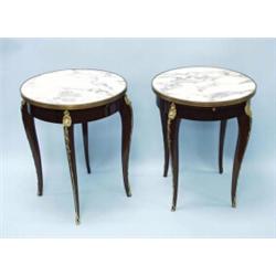 A pair of antique French Louis XV style mahogany and marble occasional tables. The veined grey ma…