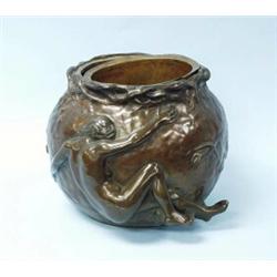 ART NOUVEAU - A. MARIONNET - An important brown patinated bronze jardiniere. Of globular form, re…