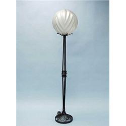 ART DECO - SABINO, FRANCE. An important French wrought iron floor lamp with frosted art glass sha…