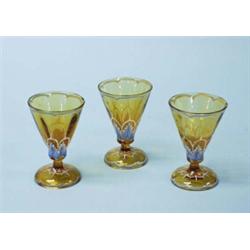 EMILE GALLE - A 6 piece French amber glass set of liqueur glasses. Each piece handpainted and ena…