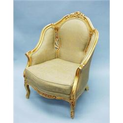 A pair of Louis XV style giltwood framed fauteils. Backrests and cabriole legs relief carved with…
