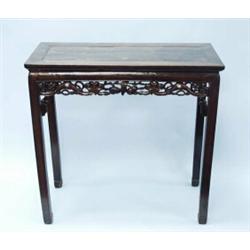 An antique Chinese blackwood altar table. Rectangular form with pierce carved scrolled apron. 35 …