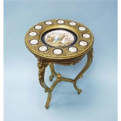 A very good antique Viennese porcelain mounted giltwood salon table. Circular top inlaid with a l…