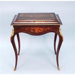 A good marquetry decorated mahagony covered jardiniere. The rectangular top with metal inset. Lid…