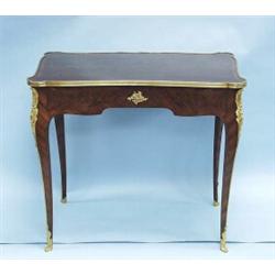 An antique French Louis XV style lady's desk. Marquetry and parquetry inlaid frame with very fine…