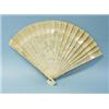 Image 1 : An antique French carved ivory fan. Satin ribbon holding together 21 panels depicting an elaborat…