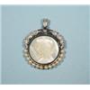 Image 1 : A circular platinum, diamond and pearl pendant with a mother-of-pearl portrait of a young girl, p…