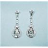 Image 1 : A pair of Art Deco design 18 kt. white gold and diamond earpendants. Each set with a very fine pe…