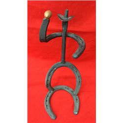 Horseshoe Cowboy Statue