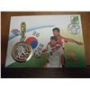 Image 1 : KOREA ENVELOPE WITH 1994 1 OZ. .999 SILVER 500 WON WORLD CHAMPIONSHIP OF FOOTBALL PROOF