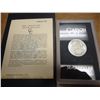 Image 1 : 1884-CC GSA MORGAN SILVER DOLLAR (UNC) WITH ORIGINAL US MINT PACKAGING AND CERTIFICATE.