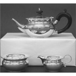 THREE PIECE GEORGE V STERLING SILVER BACHELOR'S TEA SERVICE, English. London. 1921. Maker: C.B....