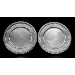 SUPERB SET OF TWELE STERLING SILVER SERVICE PLATES, American. Circa 1930. Maker: Black, Starr,...