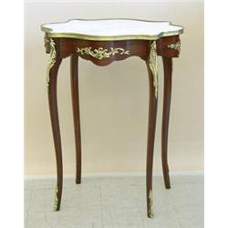 LOUIS XV STYLE GILT BRONZE MOUNTED MAHOGANY SIDE TABLE, The serpentine marble inset top above t...