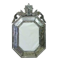 BAROQUE STYLE VENETIAN MIRROR, Italian. 19th Century. Of octagonal shape, surmounted by a scrol...