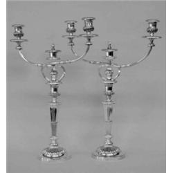 PAIR OF GEORGE III SHEFFIELD PLATED THREE LIGHT CANDELABRA, English. Circa 1810. Maker: Matthew...
