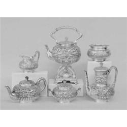 SIX PIECE TIFFANY & CO. REPOUSSE STERLING SILVER TEA AND COFFEE SERVICE, American. 1873-1891. C...