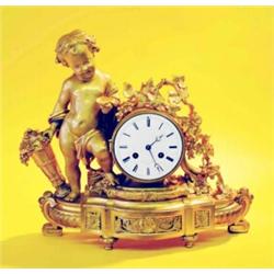 LOUIS XV STYLE GILT BRONZE MANTEL CLOCK, French. Late 19th Century. The 4 1/2" enamel dial sign...