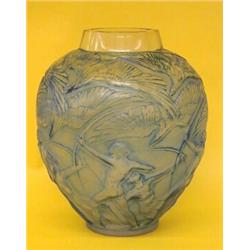 R. LALIQUE MOLDED AND FROSTED BLUE GLASS "ARCHERS" VASE, French. Circa 1921. Engraved R. Laliqu...