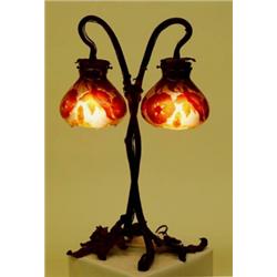 FINE GALL+ CAMEO GLASS AND WROUGHT IRON TWO LIGHT TABLE LAMP, French. Circa 1900. Each shade si...