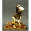 Image 1 : CARVED IVORY, BOXWOOD AND PATINATED METAL GROUP, Japanese. 20th Century. Of a fisherman standin...