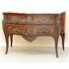 Image 1 : LOUIS XV STYLE GILT BRONZE MOUNTED MAHOGANY COMMODE, French. Early 19th Century. The serpentine...