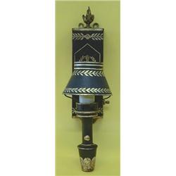 PAIR OF TOLE SCONCES AND SHADES, Each rectangular box form backplate surmounted by a flame fini...