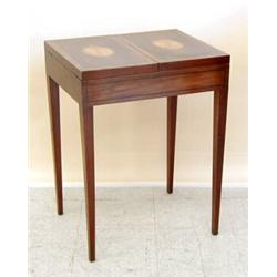 GEORGE III STYLE INLAID MAHOGANY GAME TABLE, American. By Baker. The divided hinged top inlaid...