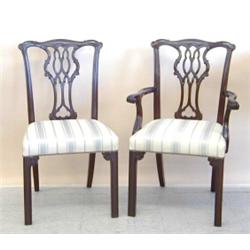 SET OF EIGHT GEORGE III STYLE MAHOGANY DINING CHAIRS, Comprising: two arm and six side chairs....