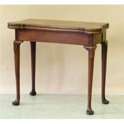 GEORGE III MAHOGANY CONCERTINA-ACTION CARD TABLE, English. Late 18th Century. The shaped top wi...