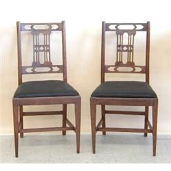 PAIR OF GEORGE III WALNUT SIDE CHAIRS, Probably Irish. 18th Century. Each with pierced backspla...