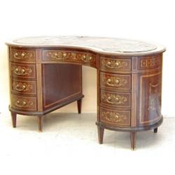 EDWARDIAN INLAID MAHOGANY KIDNEY SHAPED DESK, English. Early 20th Century. The leather inset to...