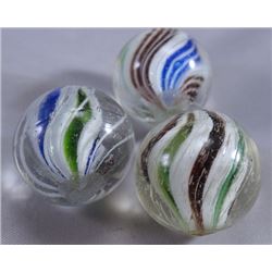 Lot 97: 3 Solid Core Swirls.