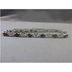 6 CTW Garnet tennis bracelet set with a Diamond